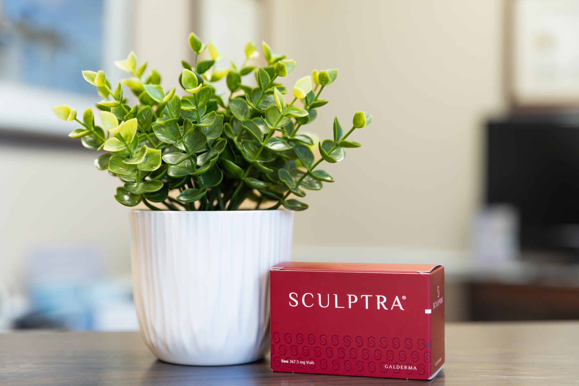 Sculptra injection points mapped on a client in Miami
