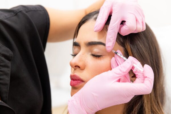 Provider administering a Botox injection at Skin Plus Beauty